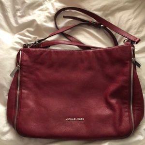 Michael Kors red purse with silver accent